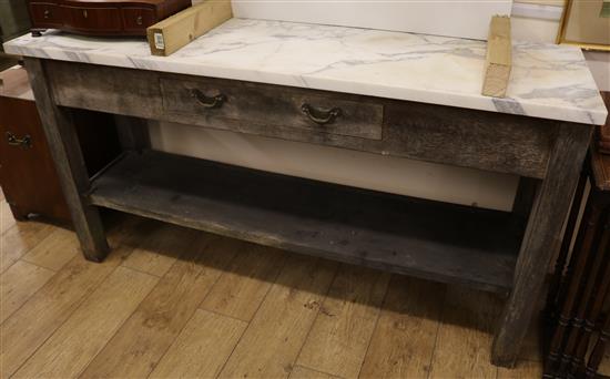 A marble topped oak side table W.160cm. D.46cm, H.85cm